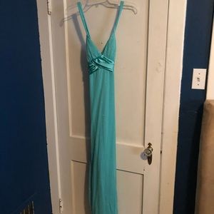 Teal sparkly prom dress with bow